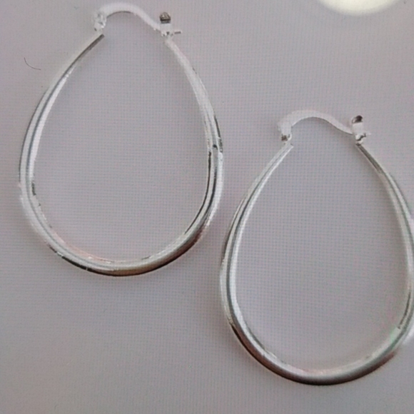 1.5 Silver Oval Hoop Earrings - Picture 2 of 4